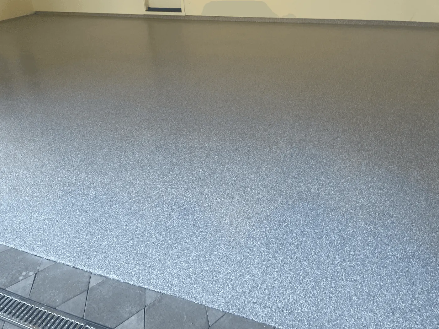 Commercial Garage Bays &mdash; full-broadcast flake floor coating