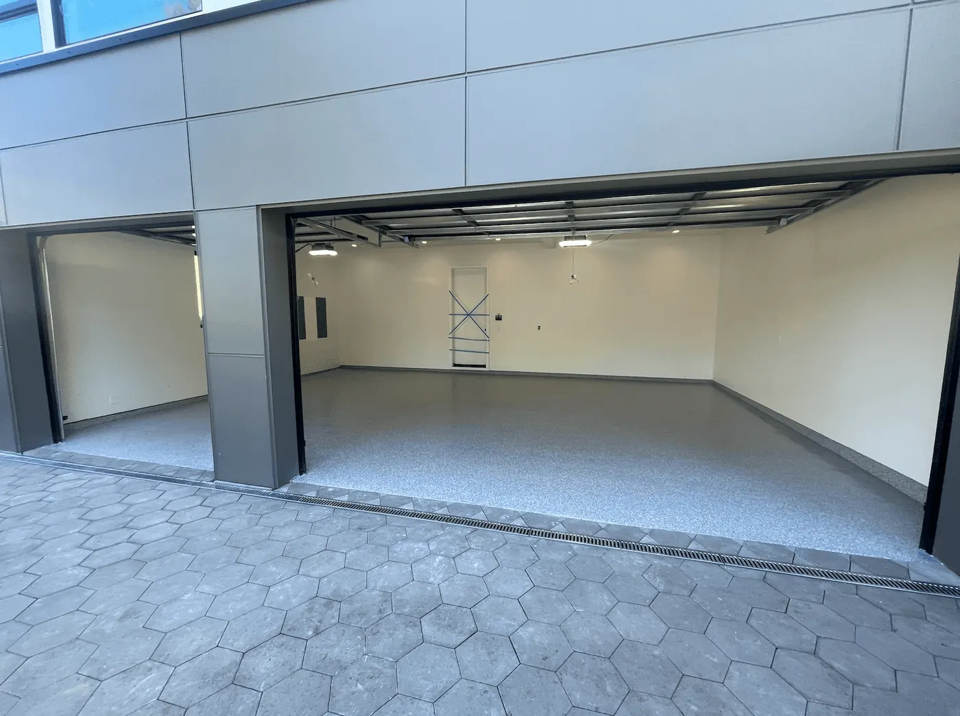 Commercial Garage Bays &mdash; full-broadcast flake floor coating