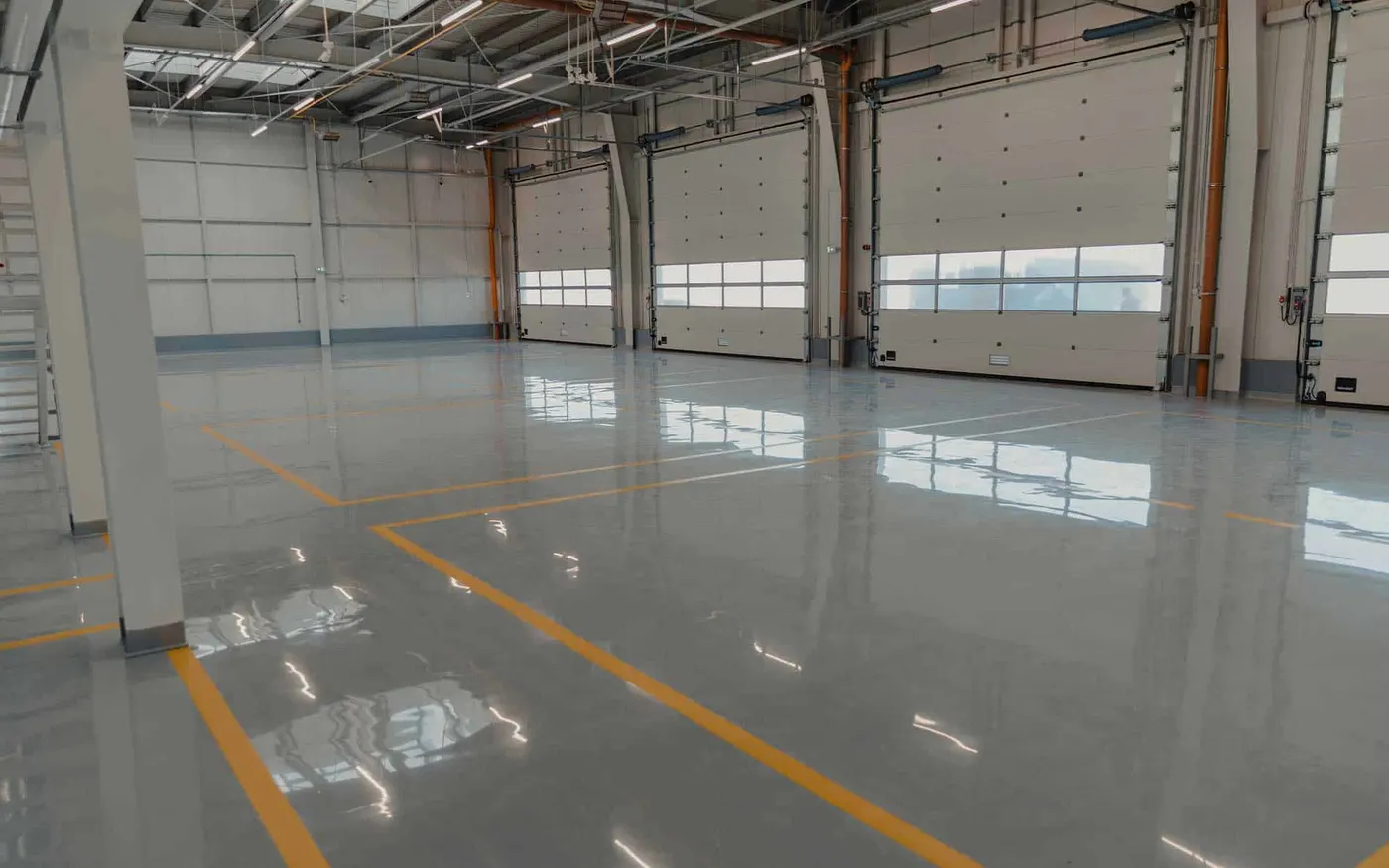 Fleet Vehicle Bays &mdash; solid colour with safety striping floor coating
