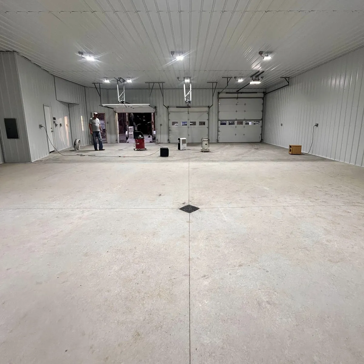 Bare concrete shop floor before coating